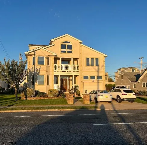 a front view of a building with street view