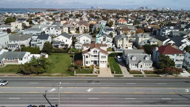an aerial view of a house with outdoor space