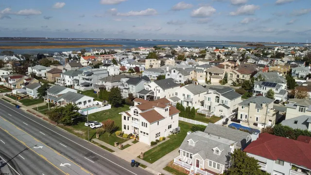 an aerial view of a city with lots of residential buildings