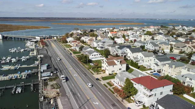 an aerial view of a city with lake view