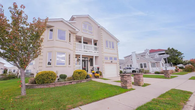 a bedroom with a bed and a mirror