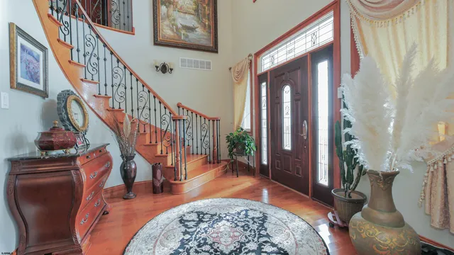 a living room with fireplace furniture and a fireplace