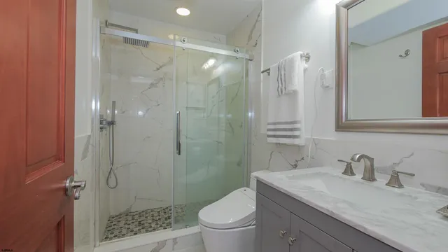 a view of a chair and table in a balcony