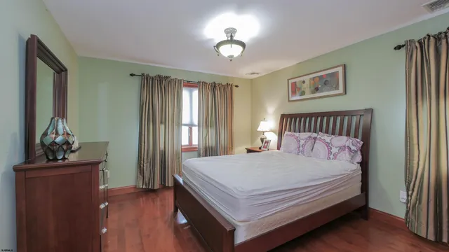 a bathroom with a toilet a sink and shower