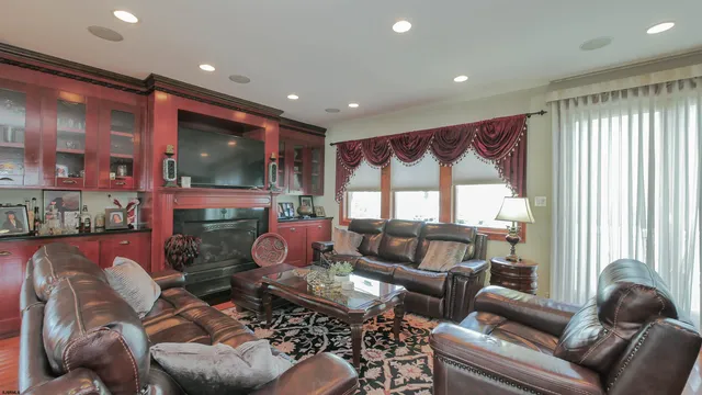 a view of a dining room with furniture wooden floor and chandelier