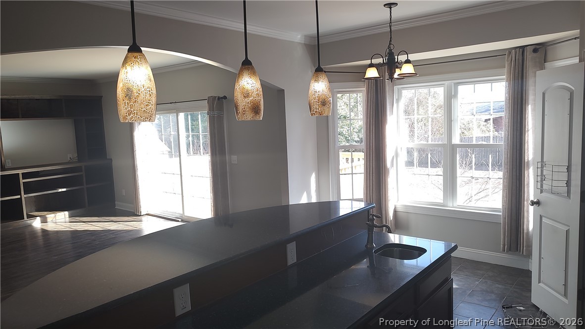 504 Brunswick Road Fayetteville, NC 28303 - Photo 17 of 50 a kitchen with sink and window