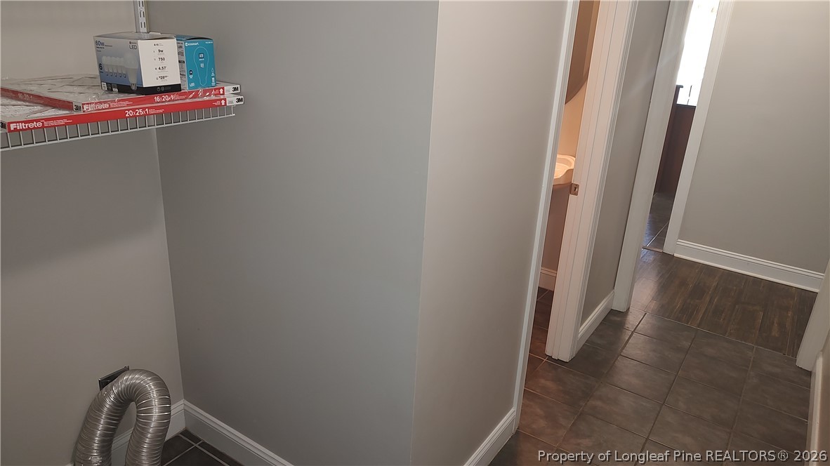 504 Brunswick Road Fayetteville, NC 28303 - Photo 28 of 50 a bathroom with a sink and a mirror