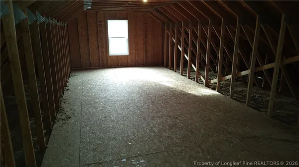 a view of backyard and garage
