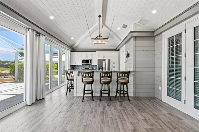 a view of living room with a large window