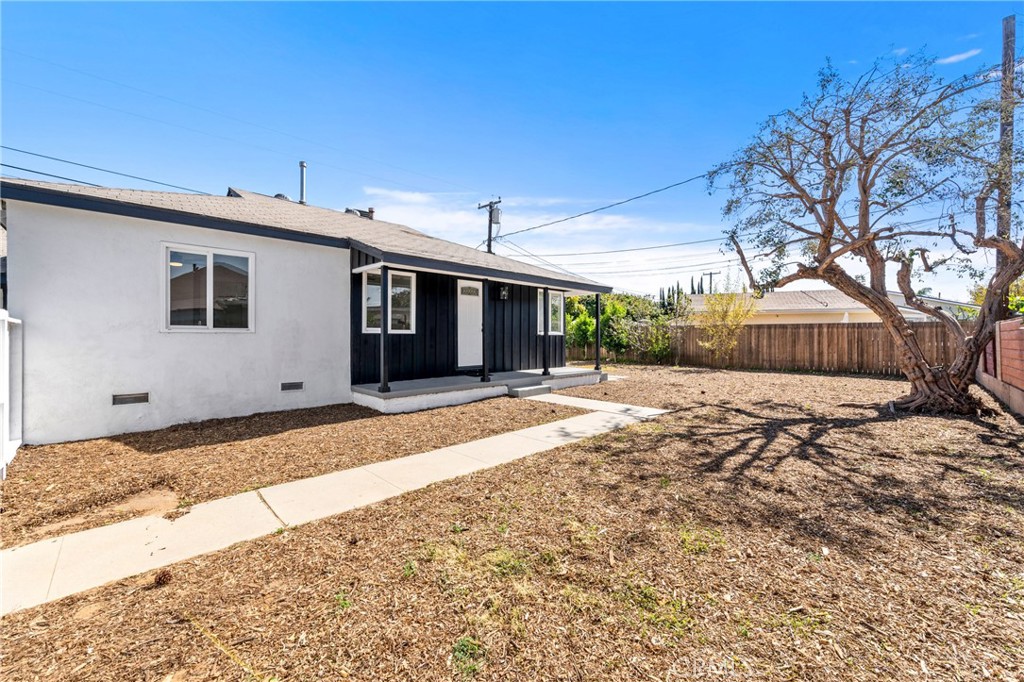 9540 Primrose Drive Riverside, CA 92503 - Photo 1 of 1 a front view of a house with a yard and garage