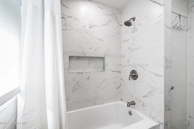 a bathroom with a bathtub