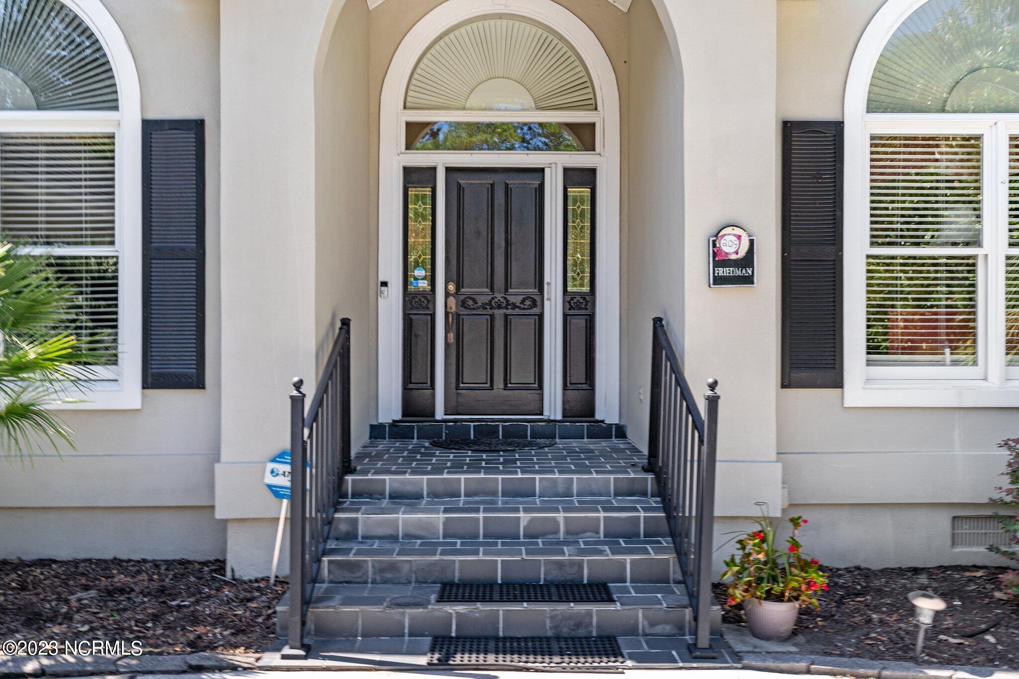 209 Rice Mill Circle Sunset Beach, NC 28468 - Photo 2 of 53 Front entrance