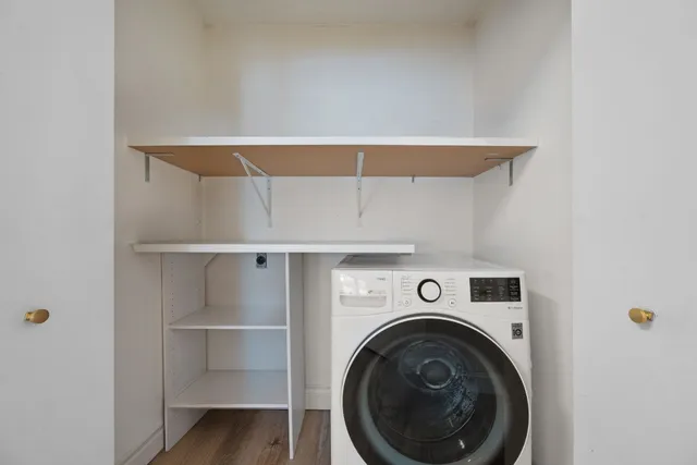 a utility room with dryer and washer