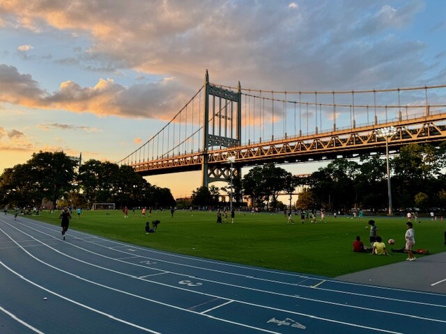19-19 24th Avenue, Unit 102 Queens, NY 11102 - Photo 32 of 36 a view of a building with a big yard