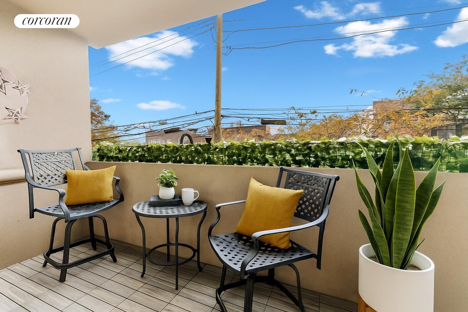 19-19 24th Avenue, Unit 102 Queens, NY 11102 - Photo 5 of 36 a lake view with table and chairs