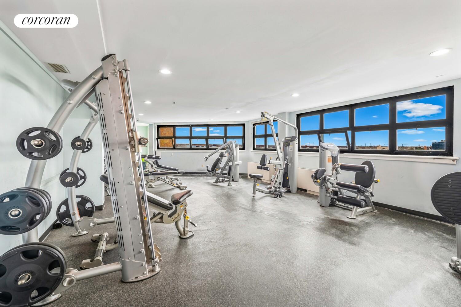 19-19 24th Avenue, Unit 102 Queens, NY 11102 - Photo 10 of 36 a view of a room with gym equipment