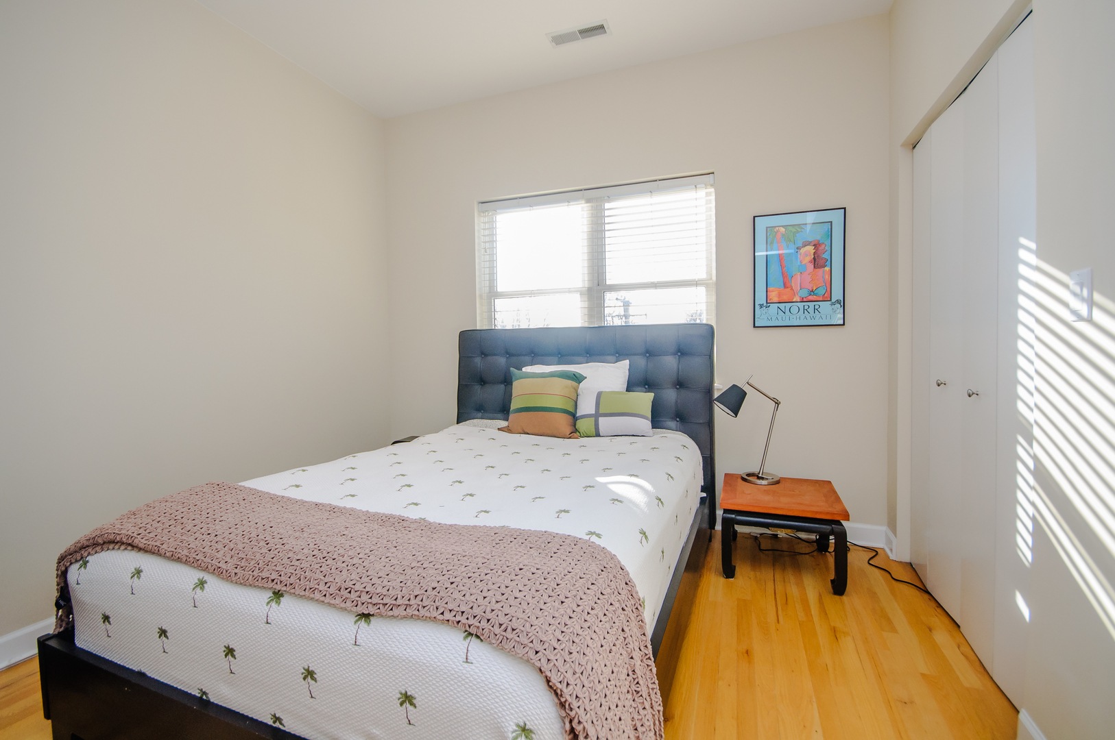 4646 North Beacon Street, Unit 203 Chicago, IL 60640 - Photo 16 of 24 a bedroom with a bed and a window