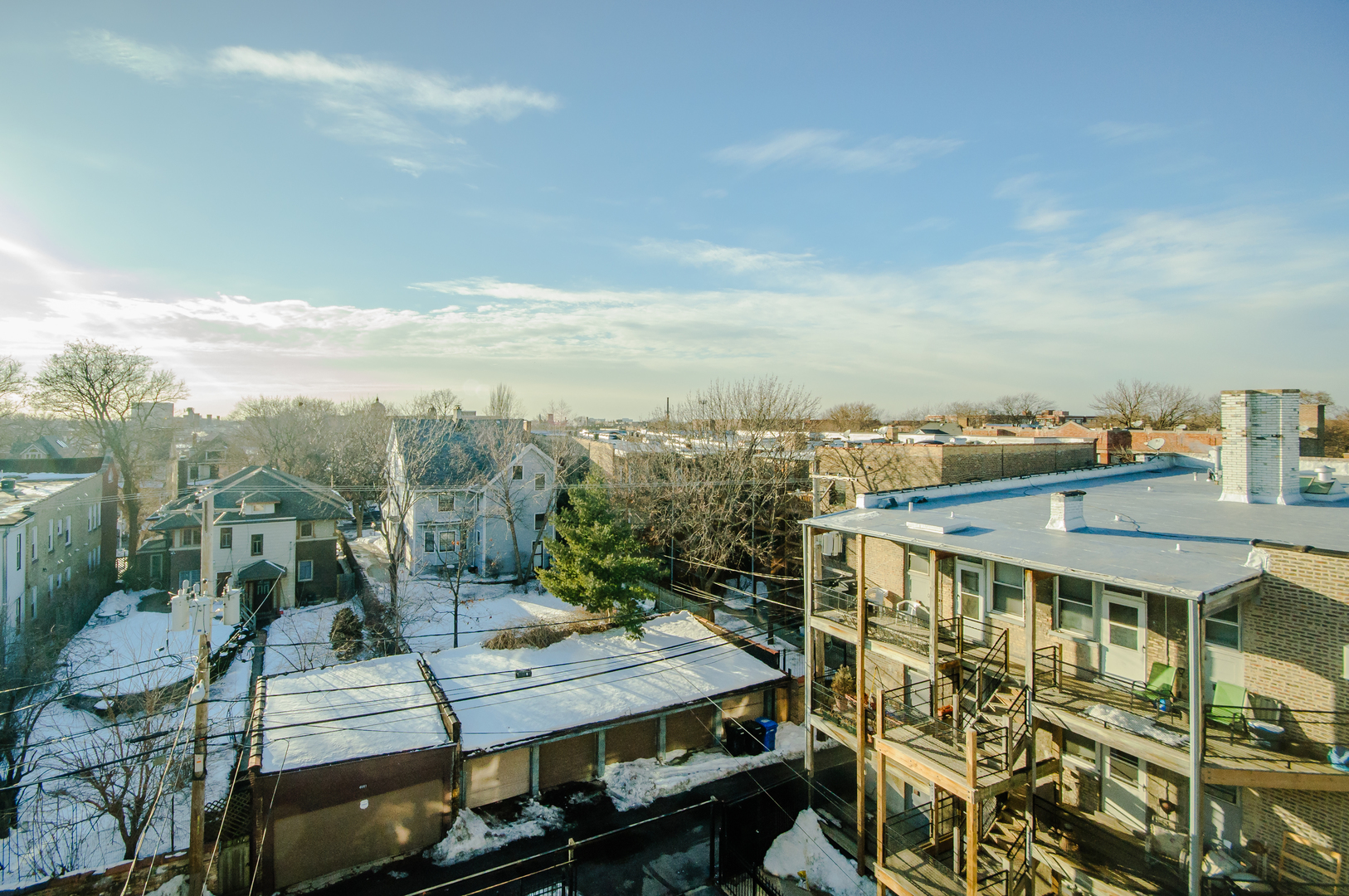 4646 North Beacon Street, Unit 203 Chicago, IL 60640 - Photo 23 of 24 a view of a balcony with two chairs