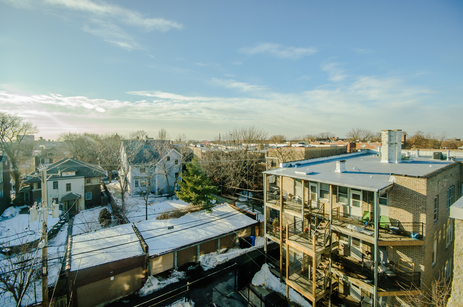 4646 North Beacon Street, Unit 203 Chicago, IL 60640 - Photo 24 of 24 a view of a balcony with an outdoor seating