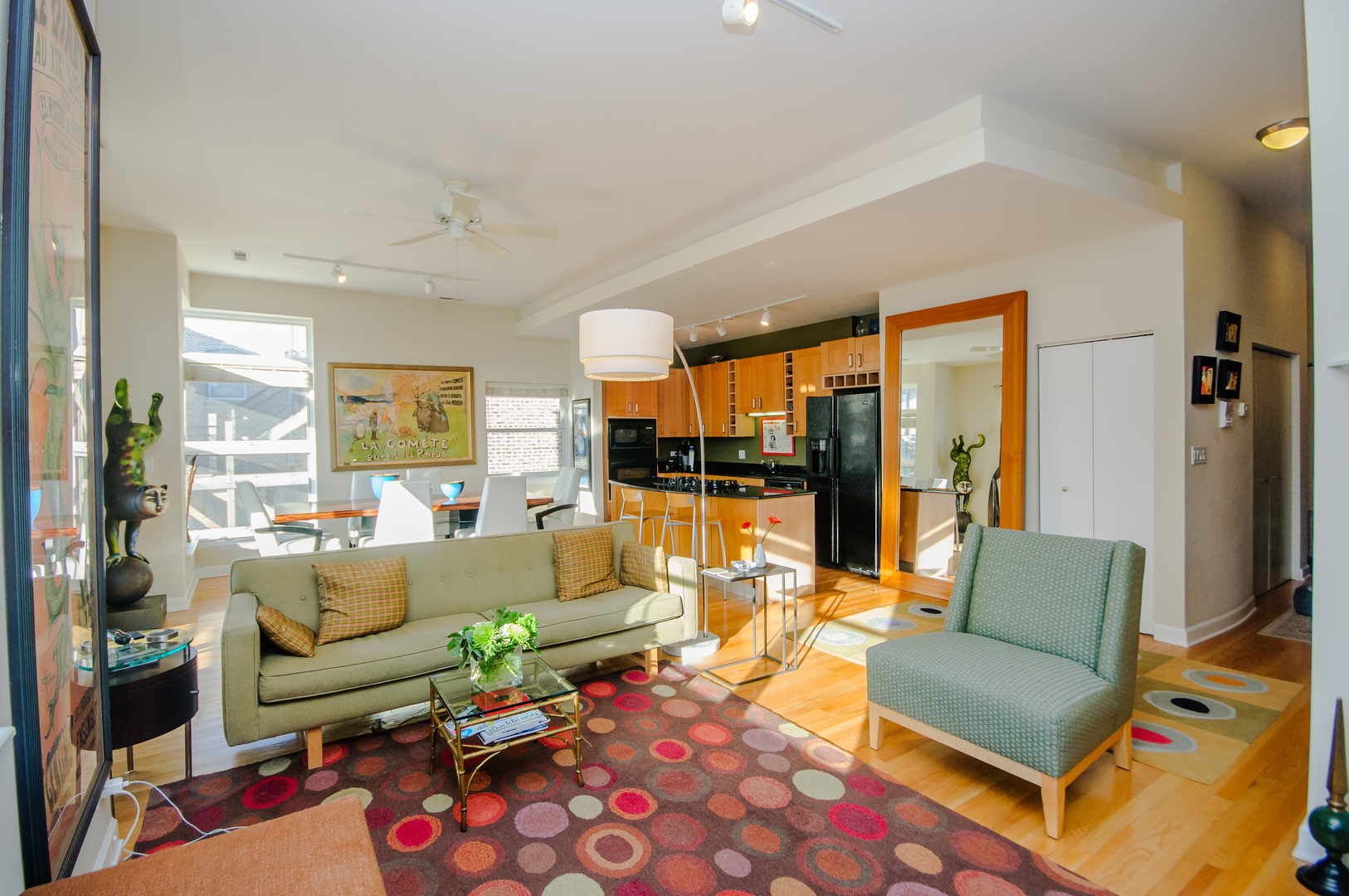 4646 North Beacon Street, Unit 203 Chicago, IL 60640 - Photo 5 of 24 a living room with furniture and a large window