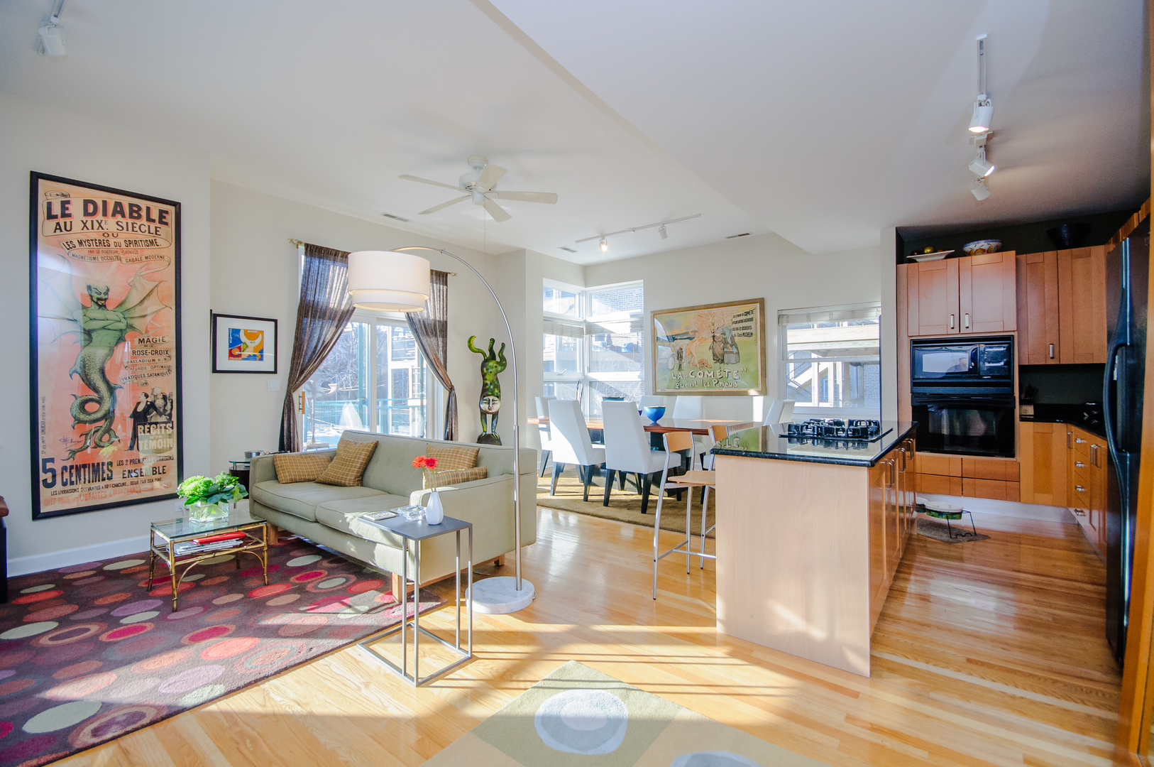4646 North Beacon Street, Unit 203 Chicago, IL 60640 - Photo 7 of 24 a living room with fireplace furniture and a wooden floor