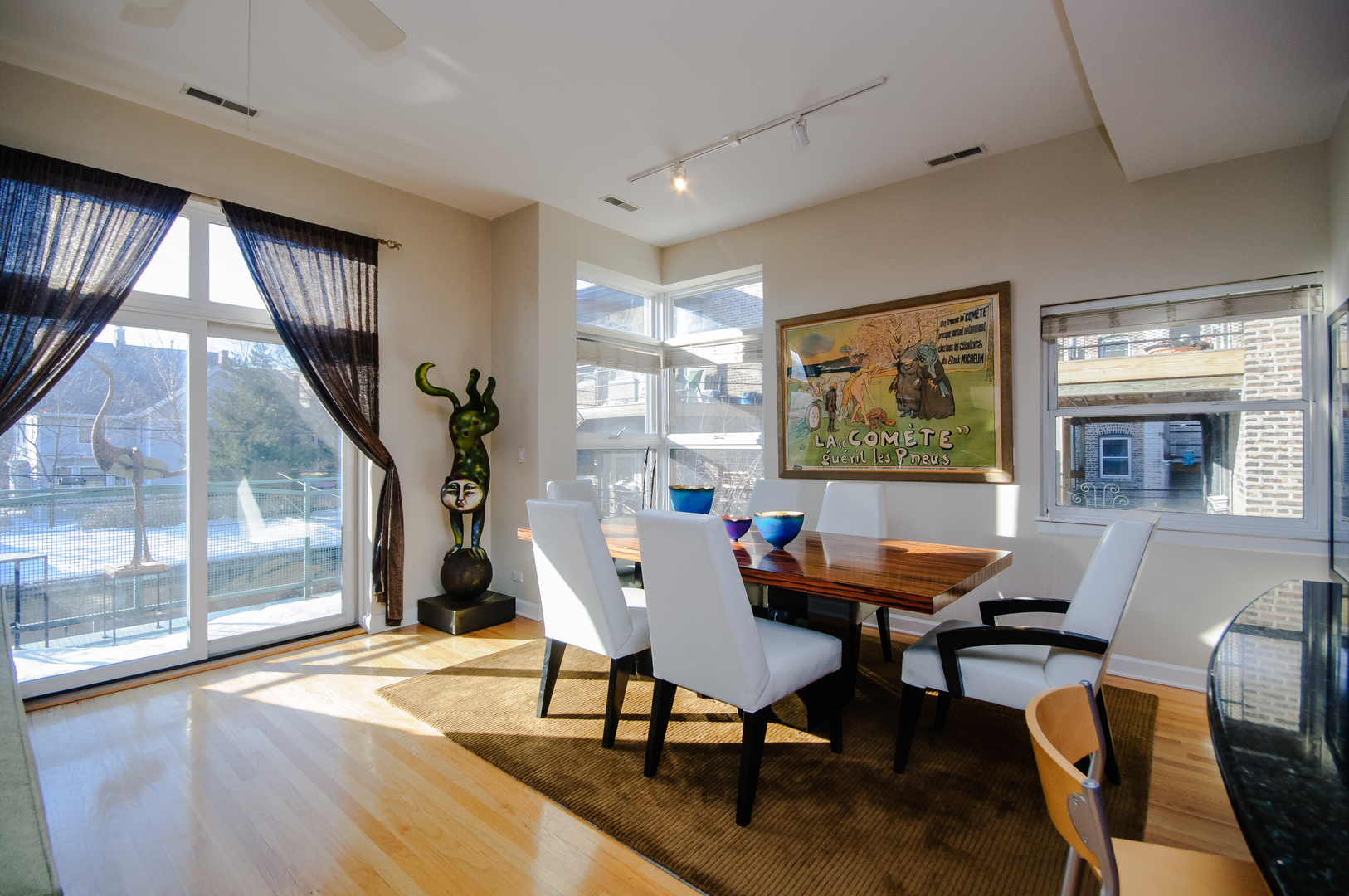 4646 North Beacon Street, Unit 203 Chicago, IL 60640 - Photo 8 of 24 a workspace with furniture hardwood and a window