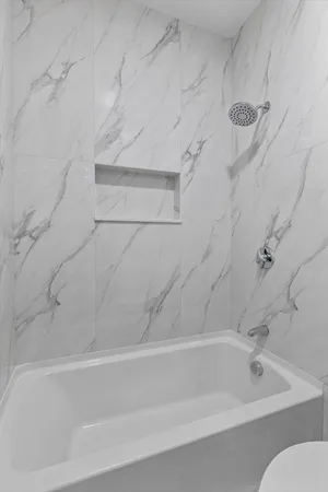 a bathroom with a bathtub