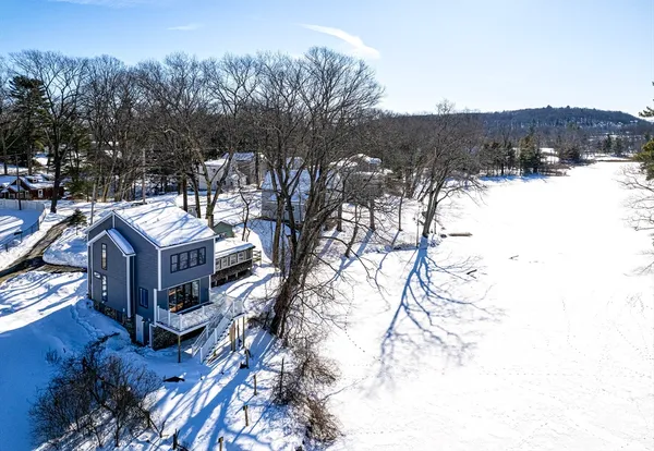 a view of a house with a snow