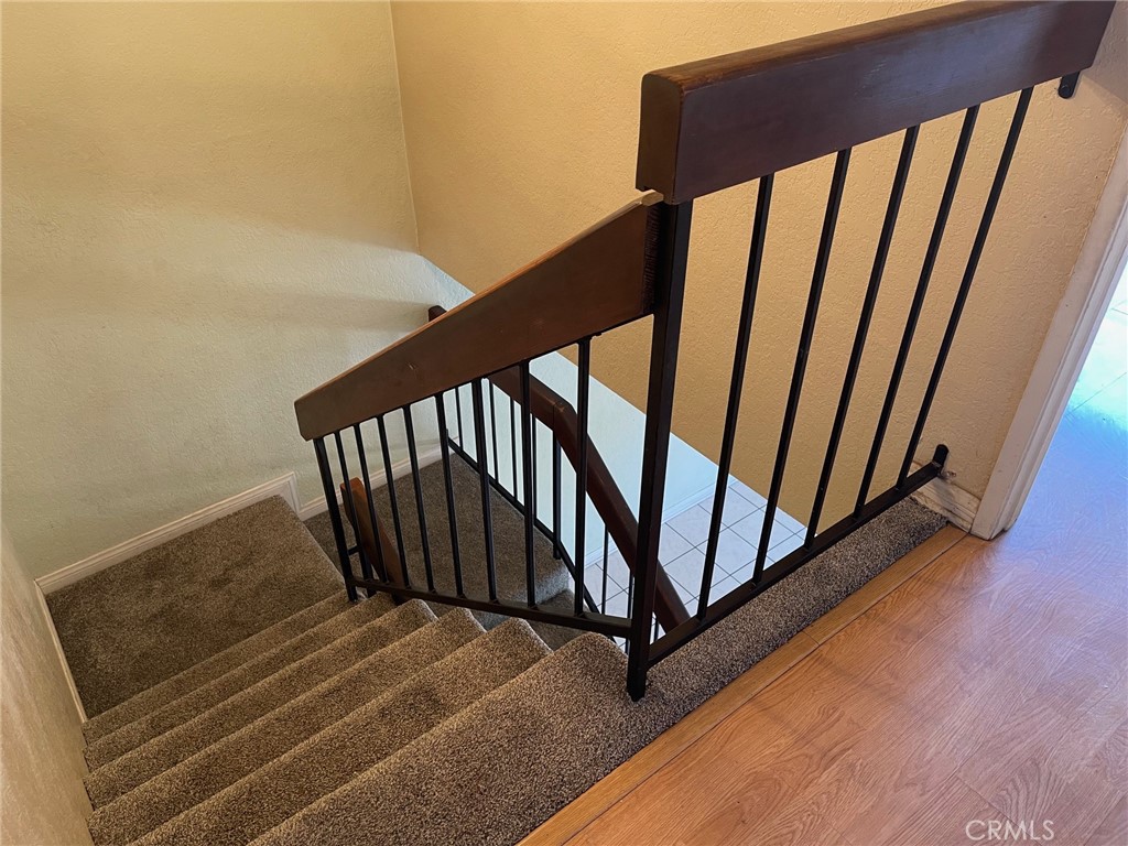 1077 South Santo Antonio Drive, Unit 15 Colton, CA 92324 - Photo 11 of 20 a view of stairs