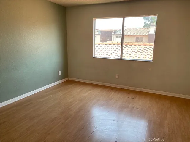 a bathroom with a tub and shower