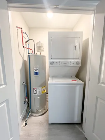 a room with water heater and storage