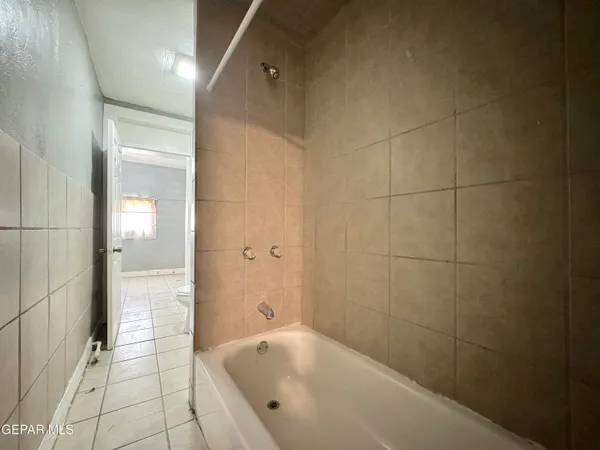 a bathroom with a sink and a bathtub