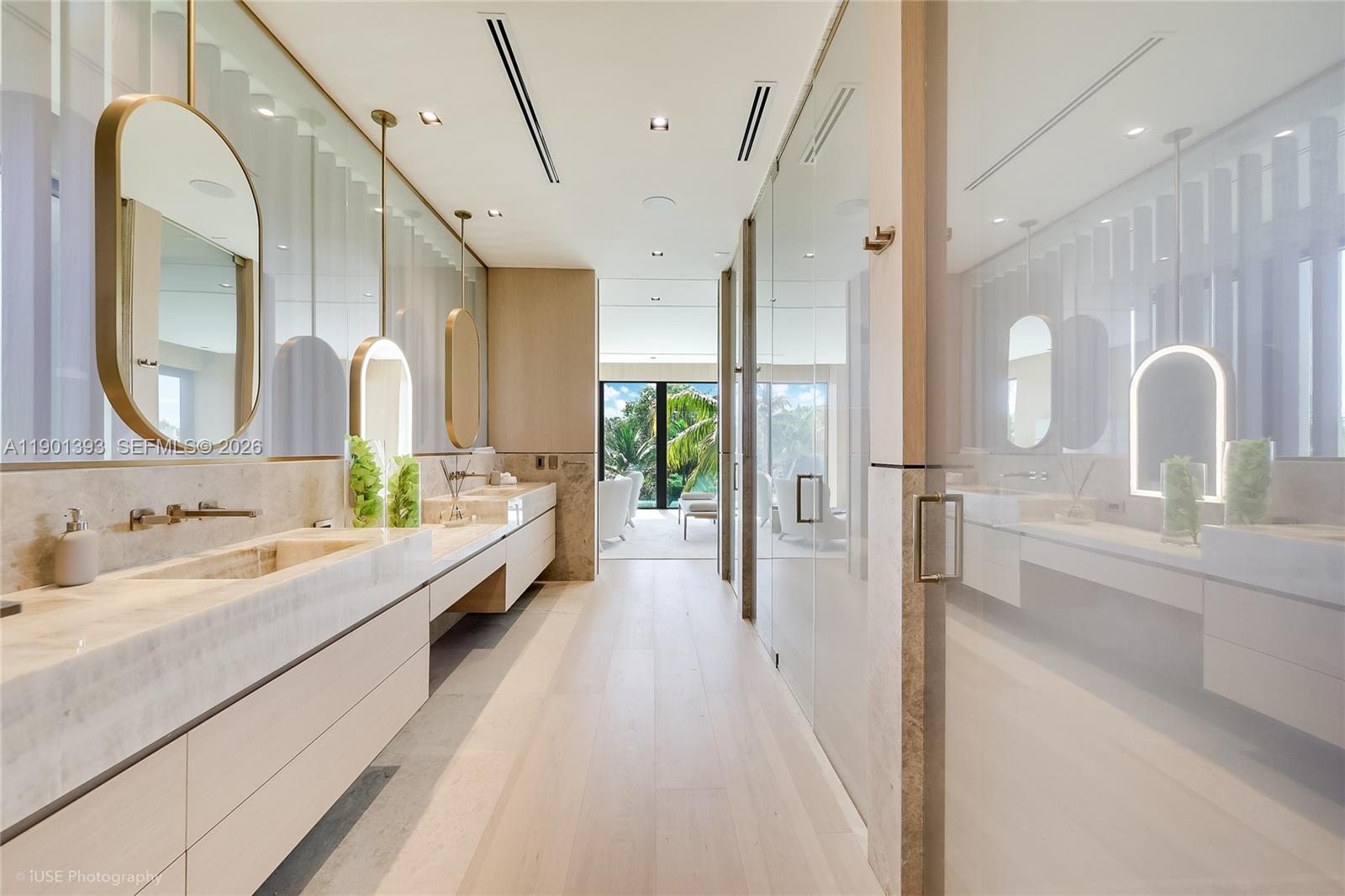 770 Lake Road Miami, FL 33137 - Photo 11 of 40 a bathroom with a double vanity sink mirror and bathtub