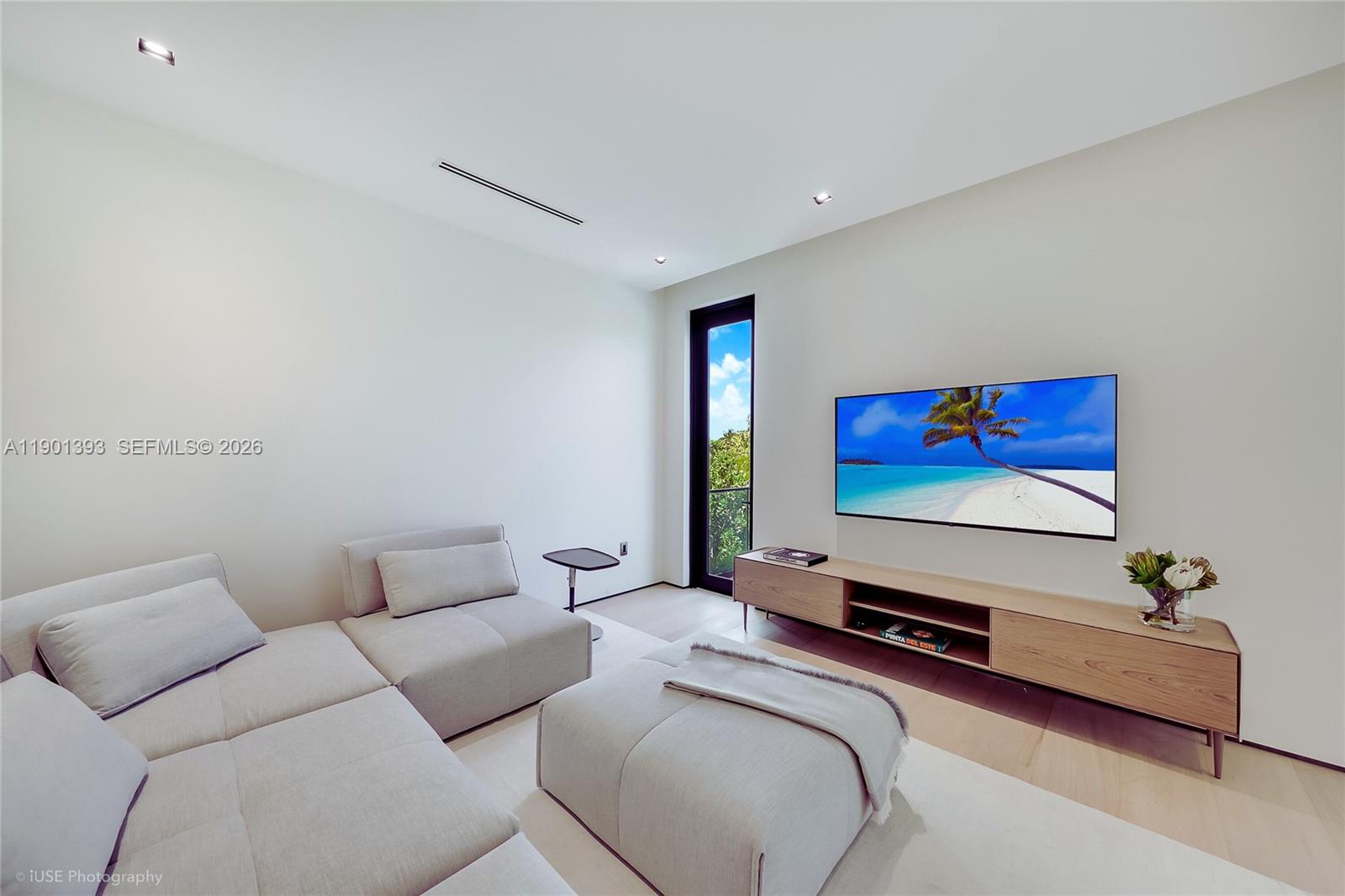 770 Lake Road Miami, FL 33137 - Photo 15 of 40 a living room with furniture and a flat screen tv