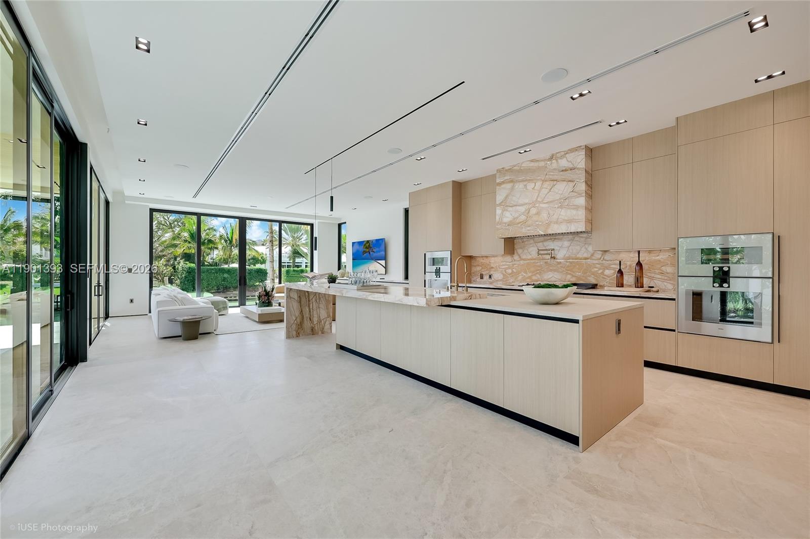 770 Lake Road Miami, FL 33137 - Photo 16 of 40 a large white open kitchen with a large window