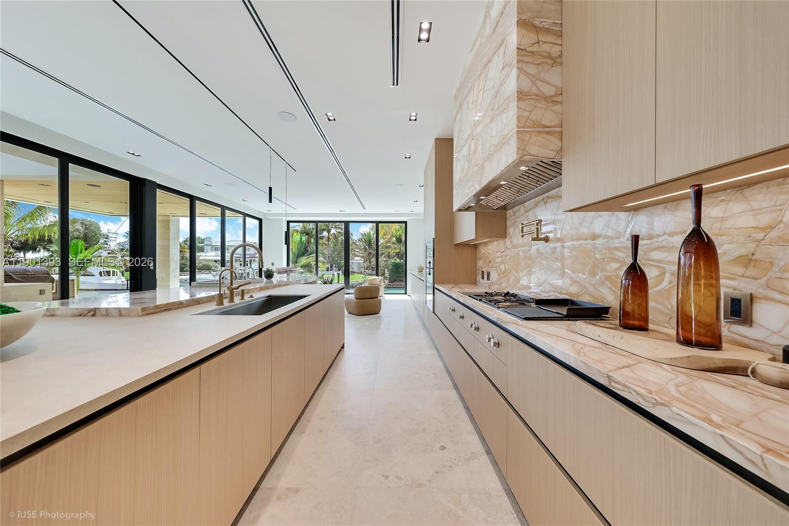 770 Lake Road Miami, FL 33137 - Photo 18 of 40 a large kitchen with stainless steel appliances granite countertop a lot of counter space