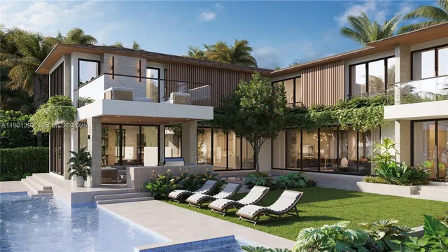 a front view of a house with garden and patio