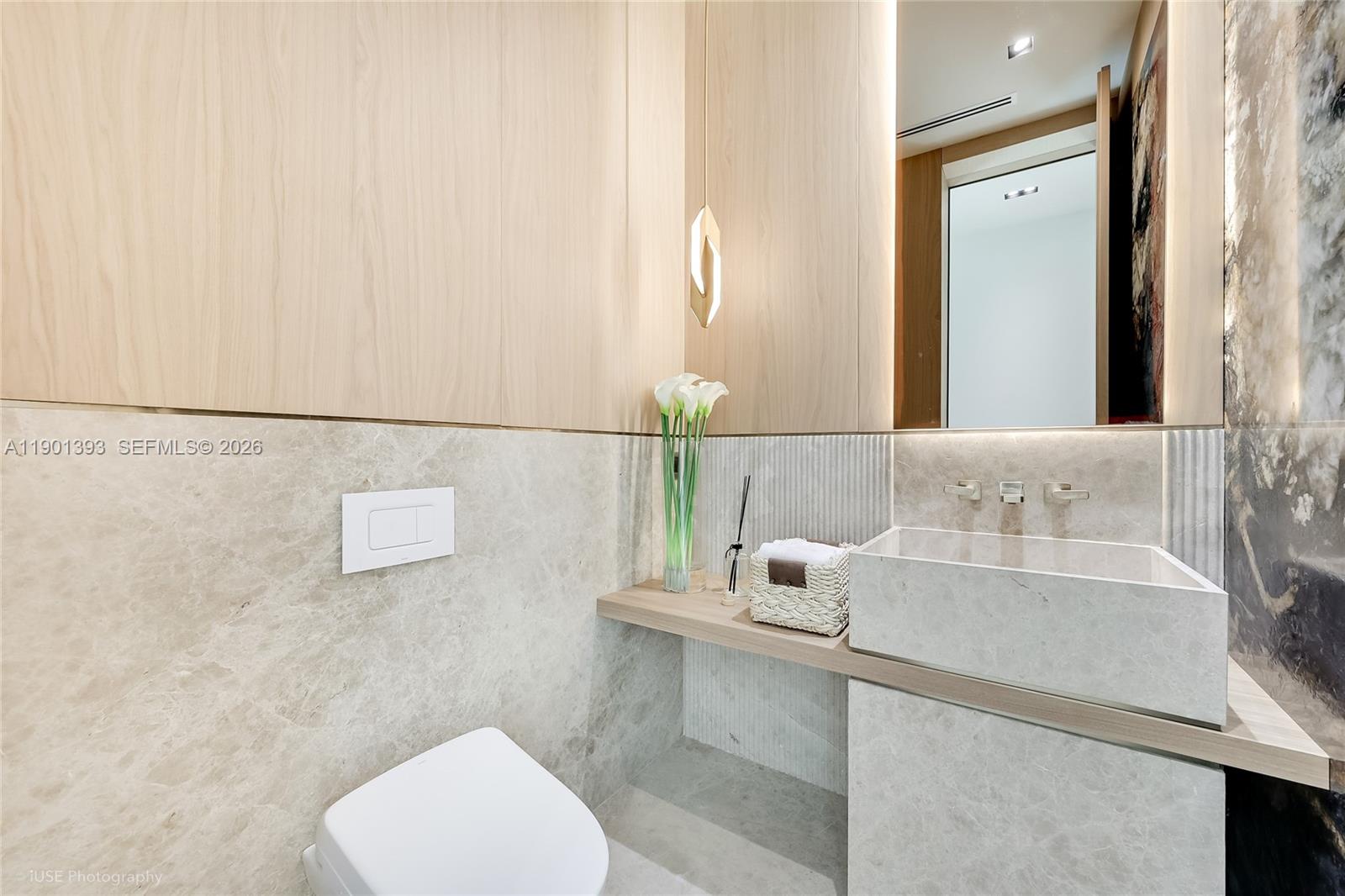 770 Lake Road Miami, FL 33137 - Photo 22 of 40 a bathroom with a sink and a mirror