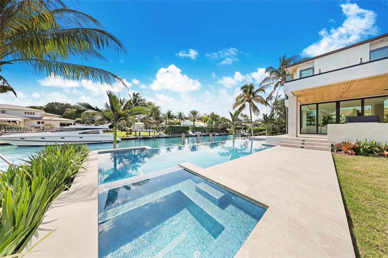 770 Lake Road Miami, FL 33137 - Photo 35 of 40 a view of a lake with a swimming pool