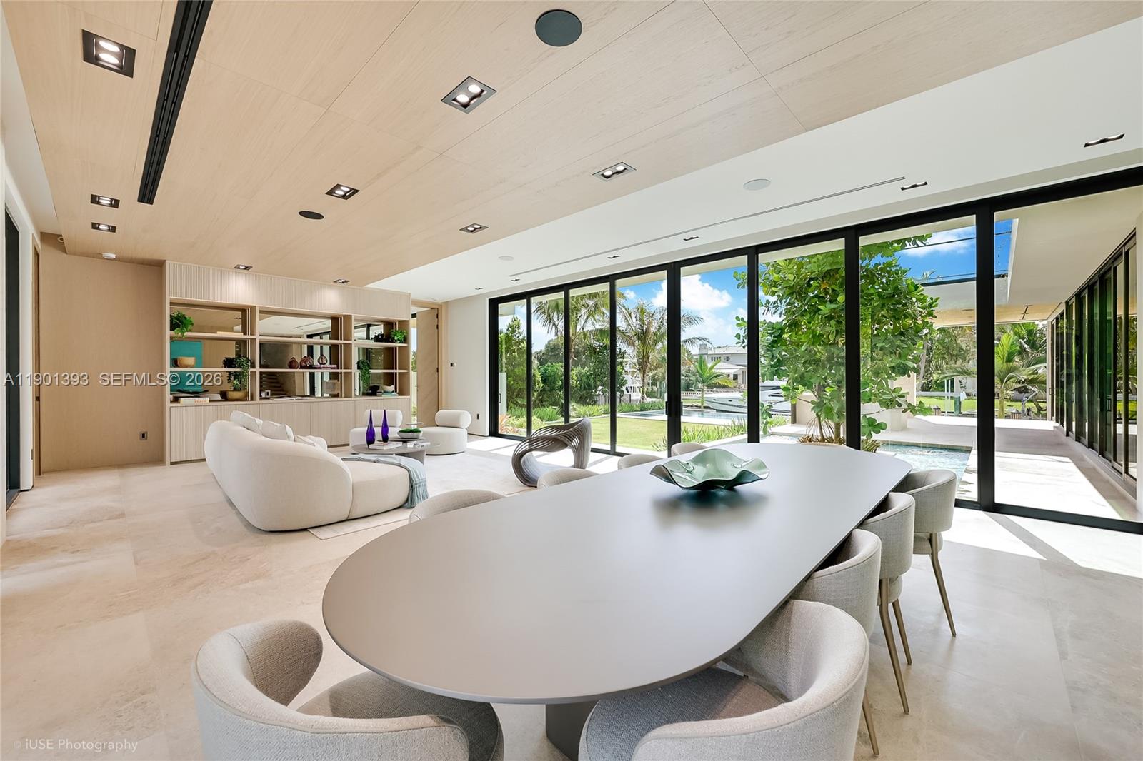 770 Lake Road Miami, FL 33137 - Photo 6 of 40 a dining room with furniture and large windows