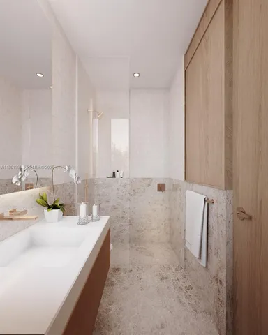 a bathroom with a double vanity sink a mirror and shower