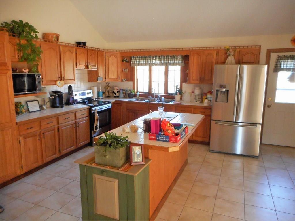497 Main Road Milford, ME 04461 - Photo 4 of 35 Spacious kitchen with nice appliances.