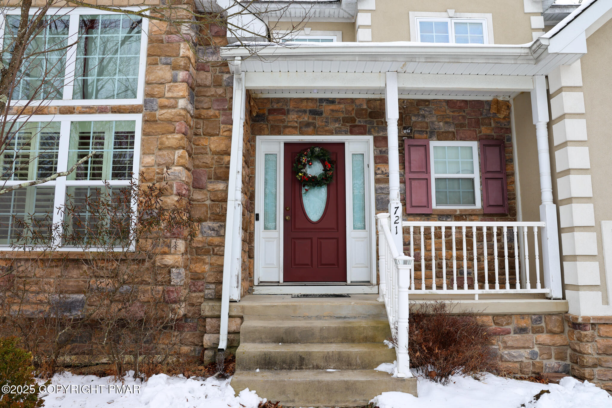 a front view of a house with a entrance