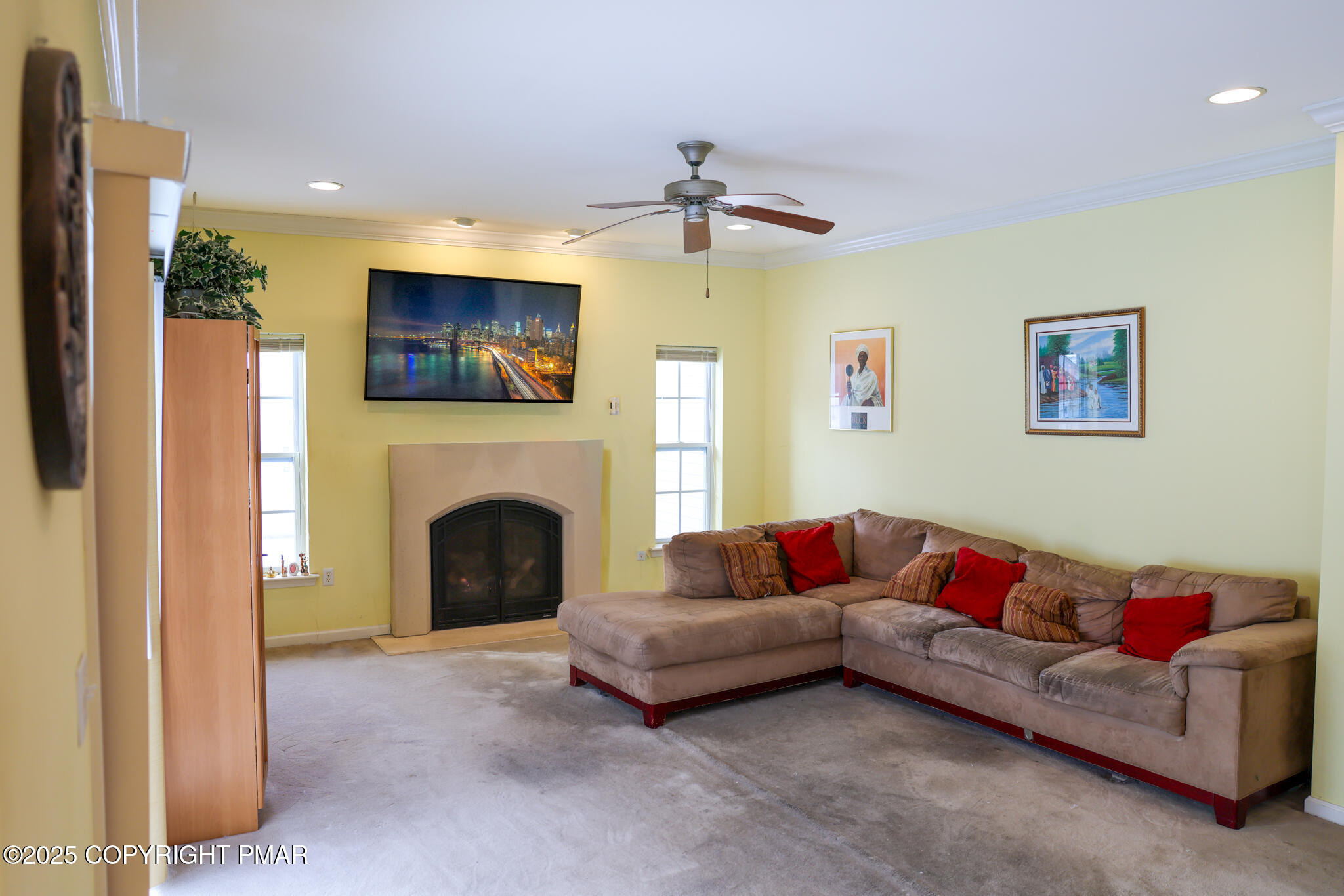 5129 Hemlock Lane Tamiment, PA 18371 - Photo 10 of 24 a living room with furniture and a fireplace