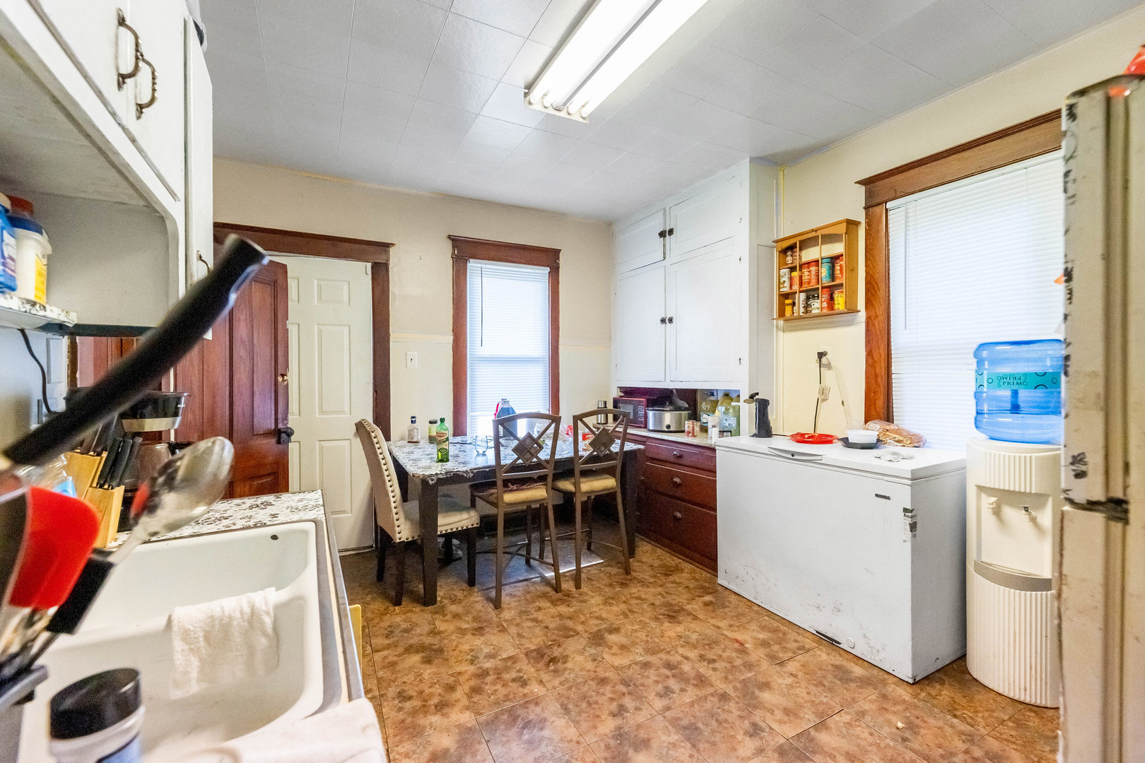 436 South 4th Avenue Kankakee, IL 60901 - Photo 12 of 32 a view of a workspace with furniture and a living room