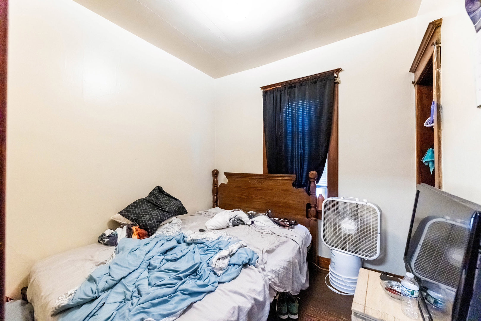 436 South 4th Avenue Kankakee, IL 60901 - Photo 17 of 32 a bedroom with a bed and chair