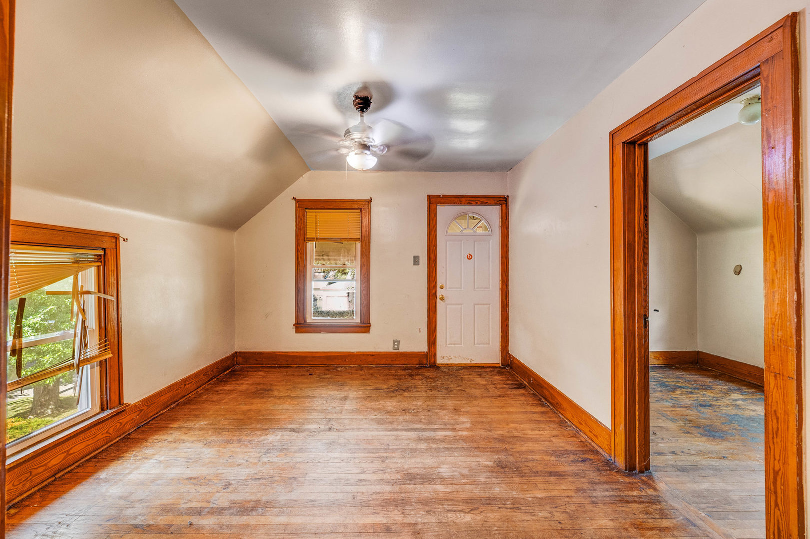436 South 4th Avenue Kankakee, IL 60901 - Photo 2 of 32 wooden floor in an empty room with a window