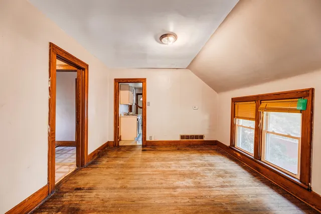 a view of an empty room and window