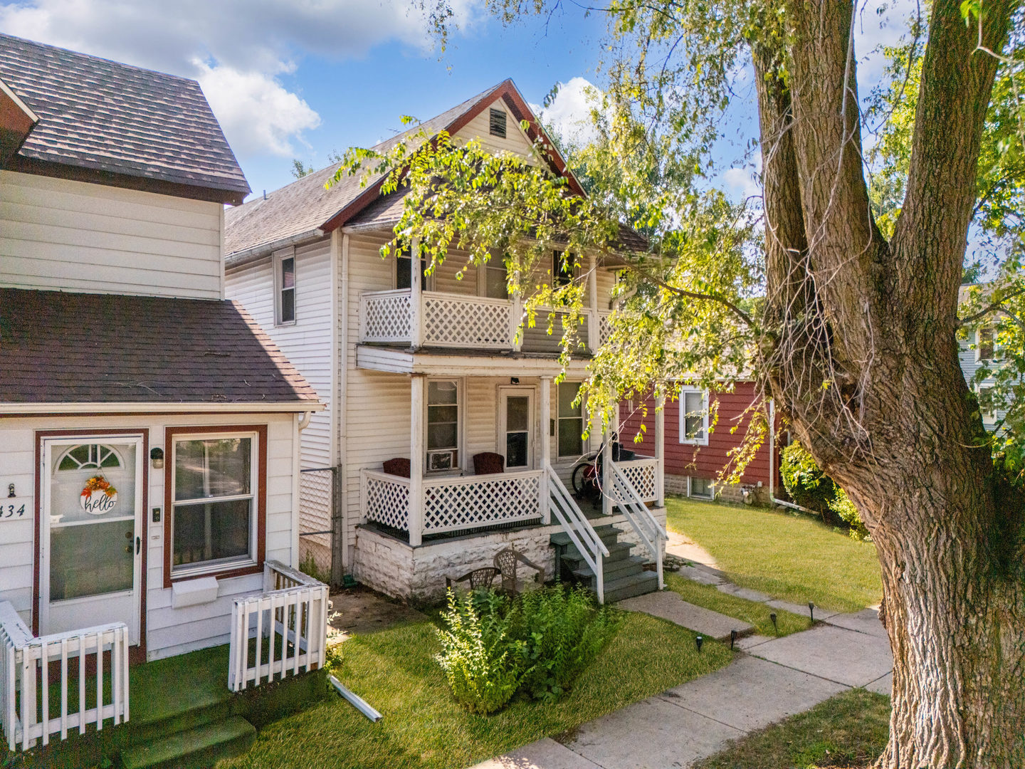 436 South 4th Avenue Kankakee, IL 60901 - Photo 32 of 32 a view of a patio with couches table and chairs and potted plants