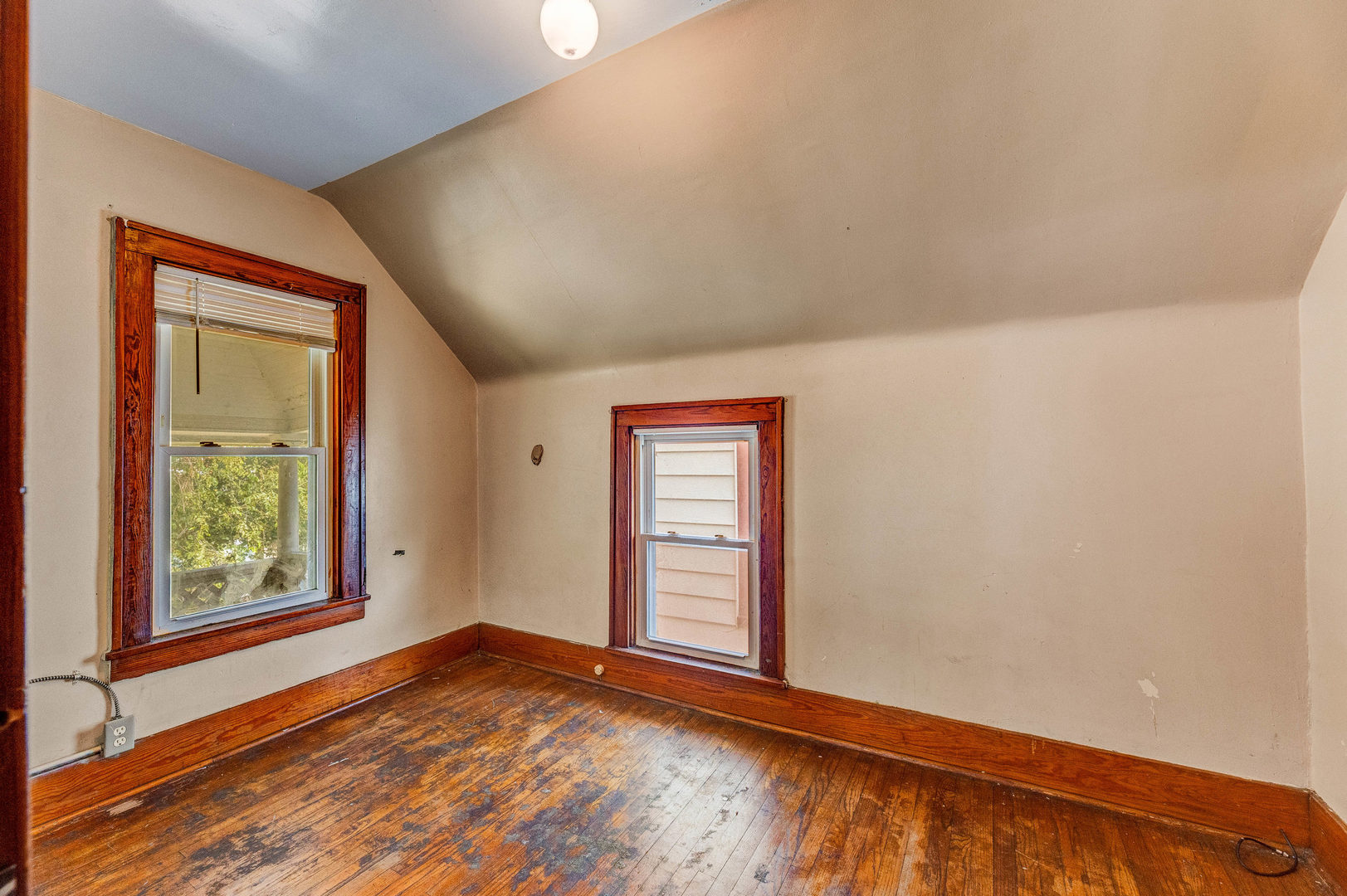 436 South 4th Avenue Kankakee, IL 60901 - Photo 8 of 32 an empty room with wooden floor and windows